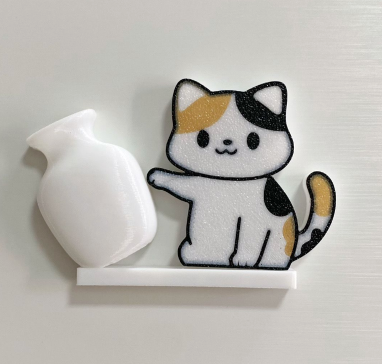 Calico Cat acrylic refrigerator magnet with white tilted vase, approximately 6 cm long