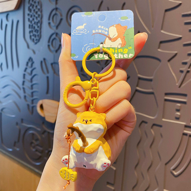 Fishing Cat Keychain – Wood Carved Style Kitty with Tiny Fishing Rod for Keys & Bags, 6 Styles