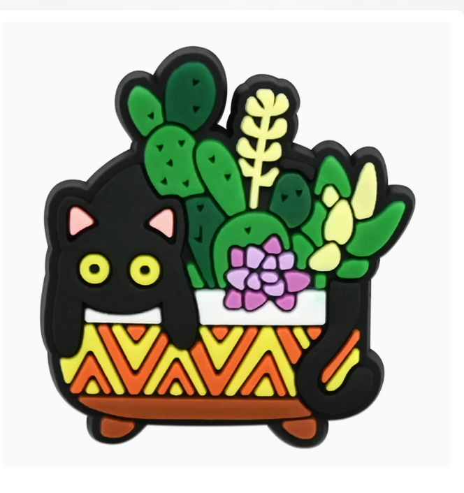 Style 11 Garden Cats PVC fridge magnet: black cat in a colorful zigzag succulent planter.