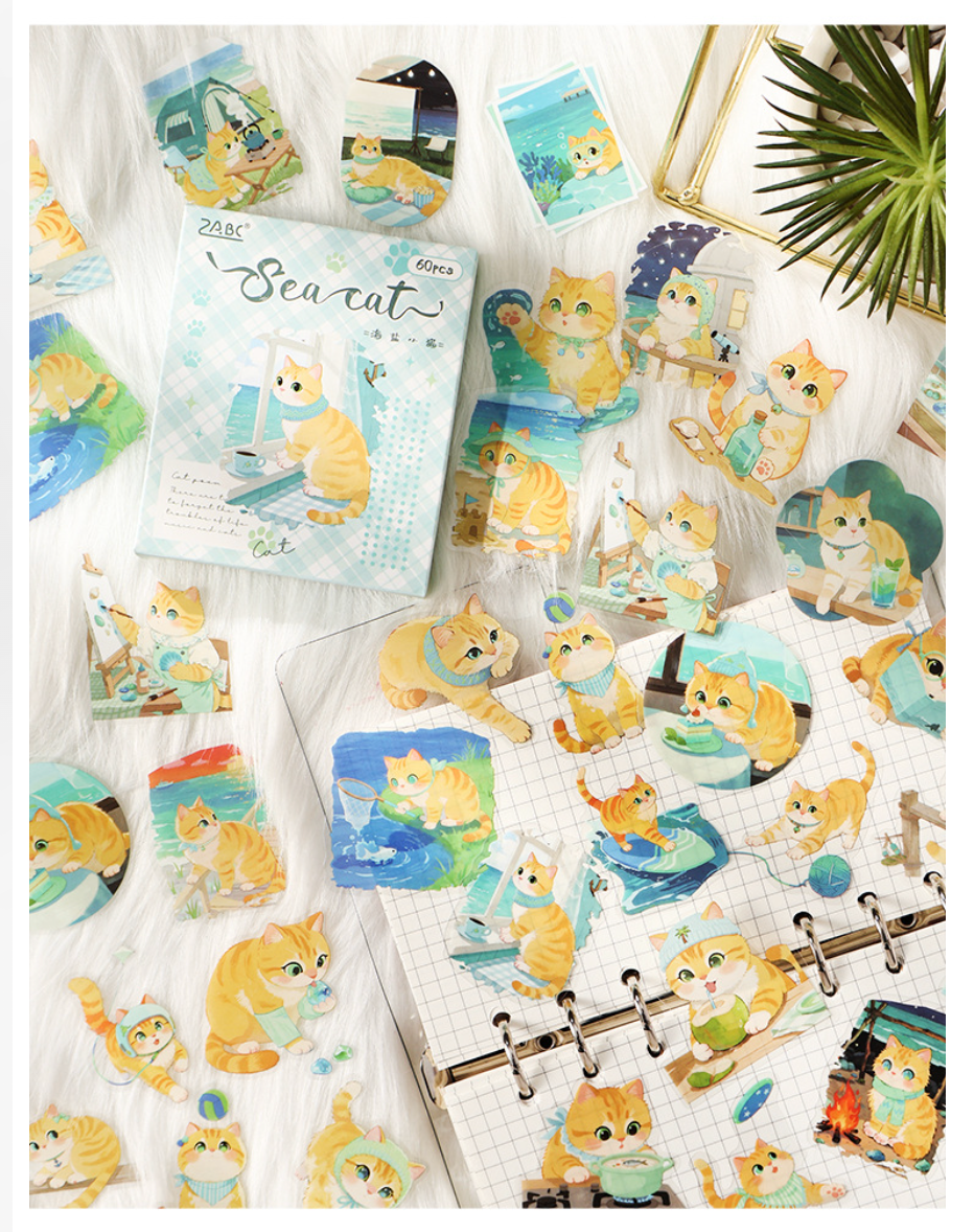 Sea Cat watercolor stickers with seaside orange kittens and a mint plaid storage box.